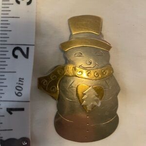Silver and brass handcrafted Snowman pin.